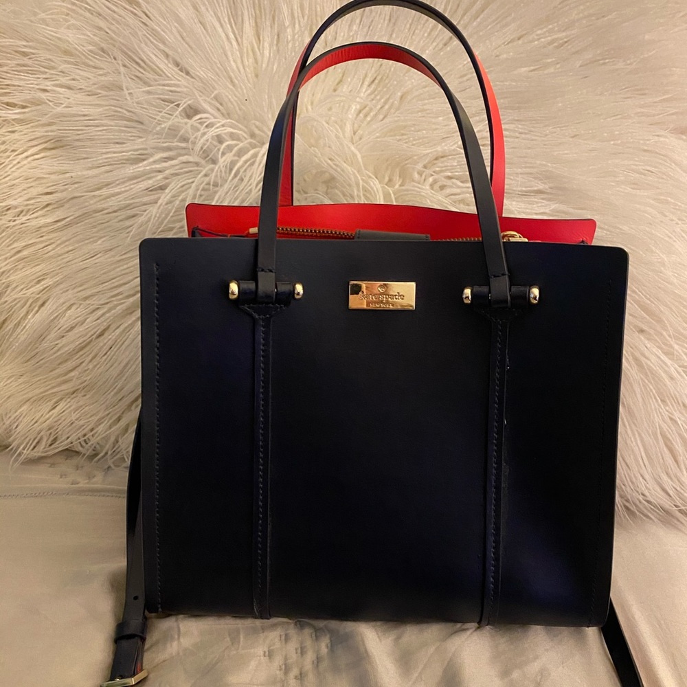 Kate Spade navy blue crossbody with pink inside